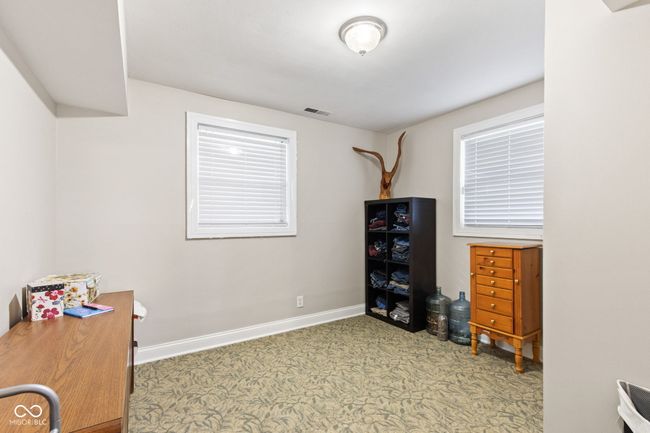 This could be a small bedroom or large closet. | Image 46