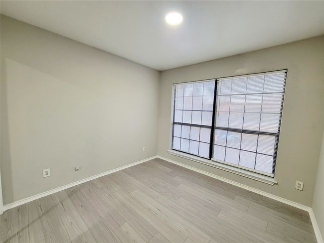 Unfurnished room featuring light hardwood / wood-style flooring | Image 17