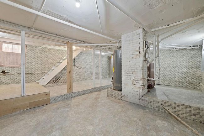 Basement with water heater | Image 24
