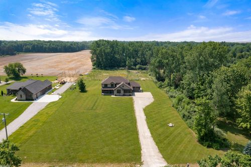 10413 Puttygut Rd, Casco, MI, 48064-1611 | Card Image