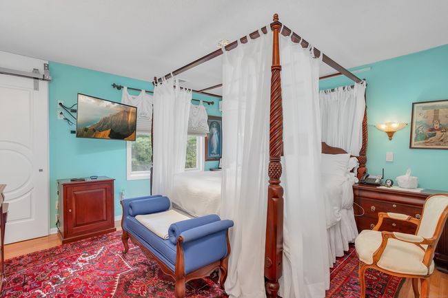The Primary Bedroom. | Image 15