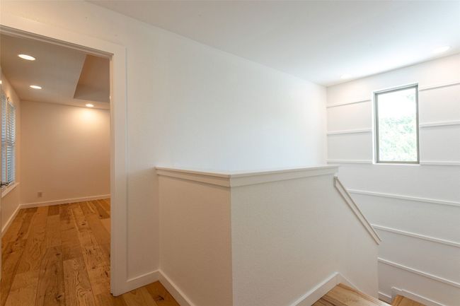 Hallway featuring light wood-type flooring and recessed lighting | Image 15