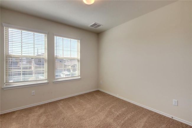 Spare room with carpet floors and baseboards | Image 31