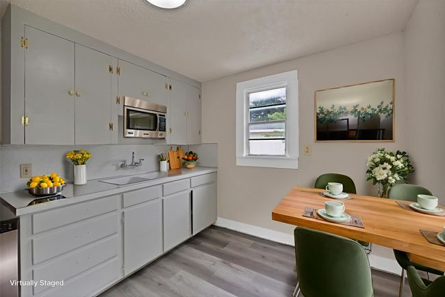 Apartment above garage with full kitchen. | Image 8