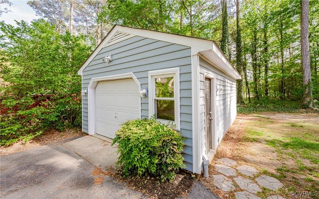 Detached garage featuring driveway | Image 48