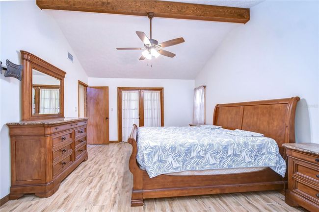 Laundry room with tub and cabinets | Image 37