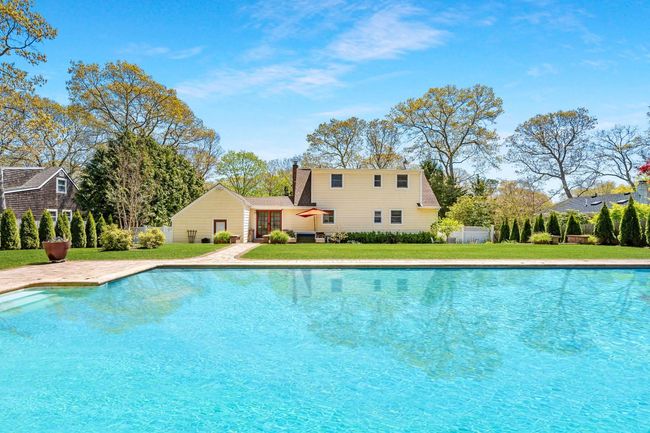 View of pool with a yard | Image 21