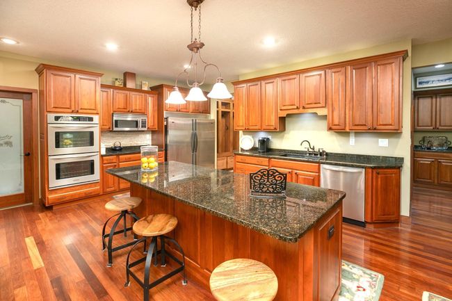 Kitchen-Cherry Cabinets and Floors | Image 14