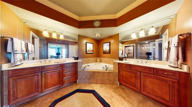 Master bath, his and hers vanities, with tub and separate shower and separate water closet. | Image 18