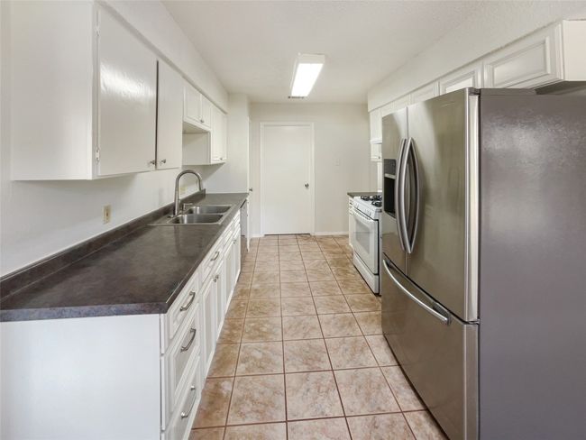 11510 Powder Mill Trl, House other with 4 bedrooms, 2 bathrooms and 2 parking in Austin TX | Image 13