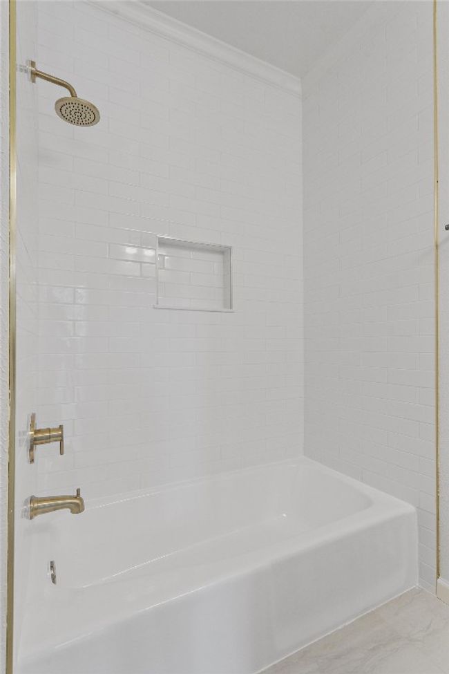 Full bath featuring crown molding and shower / bathtub combination | Image 29