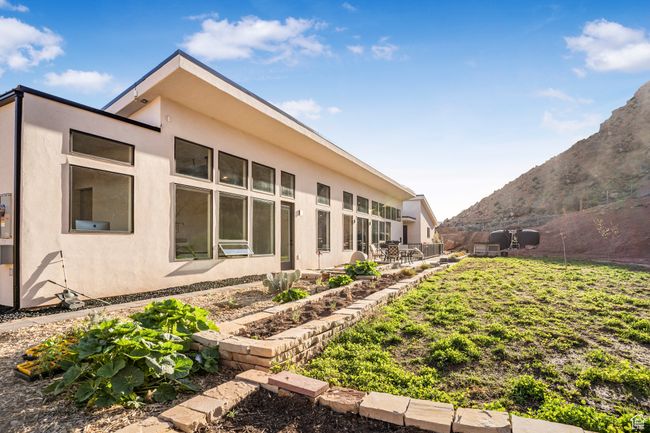 View of property exterior with stucco siding | Image 46