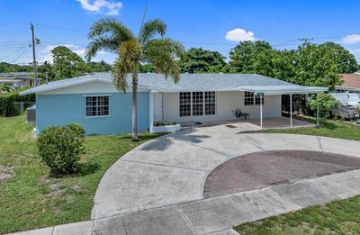 1415 W Bloxham Street, House other with 6 bedrooms, 4 bathrooms and null parking in Lantana FL | Image 1