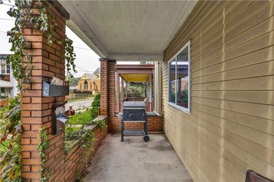 Common Area ~ Greet family & friends on the cozy front porch... | Image 2