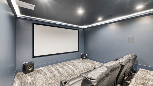 Home theater with visible vents, baseboards, dark carpet, and recessed lighting | Image 33