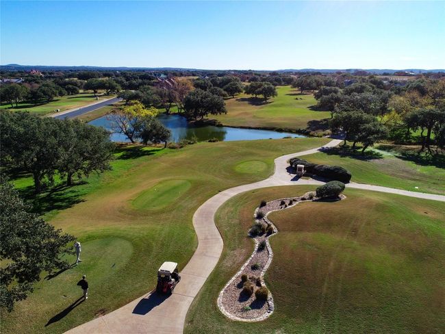 Bird's eye view with golf course view and a water view | Image 9