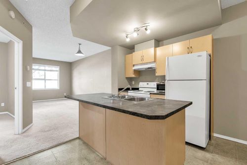 1103-73 Erin Woods Crt Se, Calgary, AB, T2B3V2 | Card Image