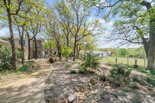 View of yard featuring stairs and fence | Image 36