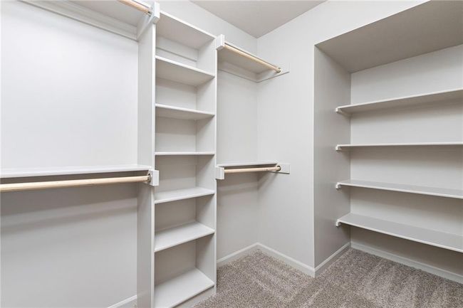 NOT ACTUAL HOME: Primary Closet | Image 27