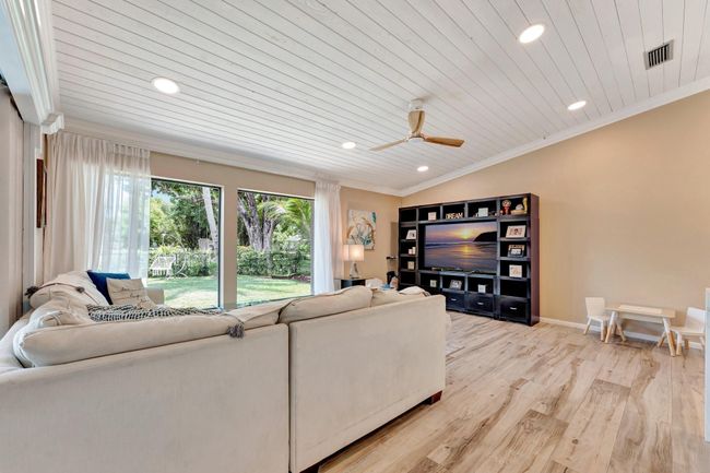 Beautiful large picture windows in family room. | Image 4