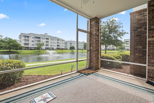 Unfurnished sunroom featuring a water view and healthy amount of natural light | Image 12