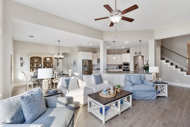 Enjoy this spacious open-concept design, where comfort meets style in the perfect setting for both everyday living and entertaining. | Image 12