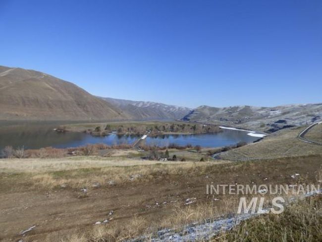 Mountain view with a large body of water | Image 44
