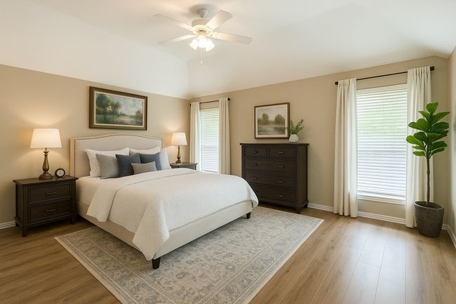 Bedroom with baseboards, multiple windows, and light wood finished floors | Image 18