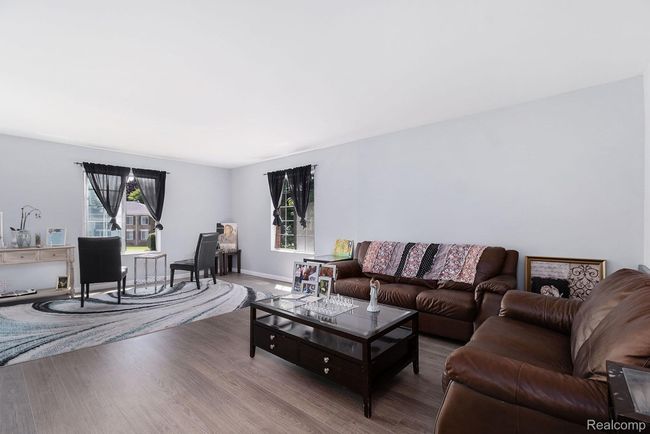 Living area featuring wood finished floors | Image 6