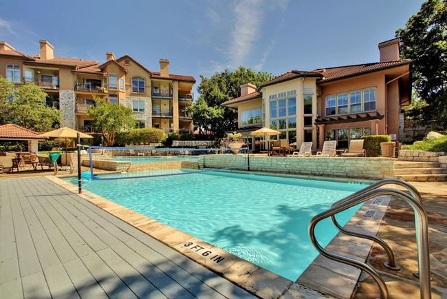 Community pool featuring a patio area | Image 25