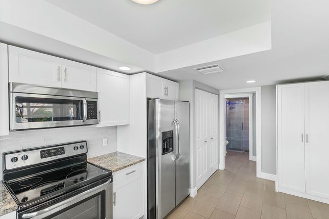 2701 Amherst Ct, Condo with 3 bedrooms, 2 bathrooms and null parking in Boynton Beach FL | Image 4