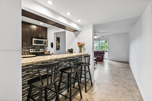 7-203-10772 La Placida Dr, Coral Springs, FL, 33065-3796 | Card Image