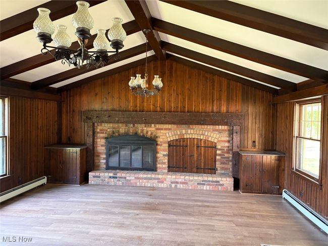 Family room with beamed cathedral ceiling | Image 17