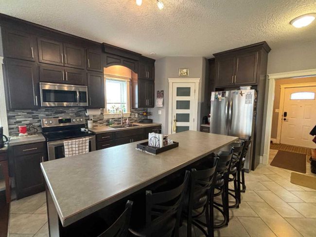 4708 42 Street, Home with 4 bedrooms, 3 bathrooms and 4 parking in Mayerthorpe AB | Image 9