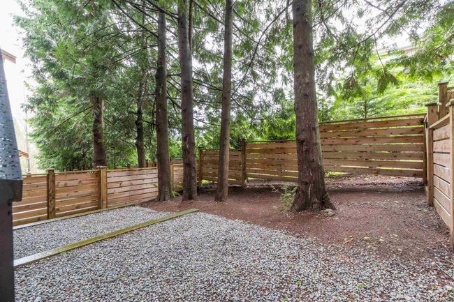 View of yard featuring a fenced backyard | Image 19