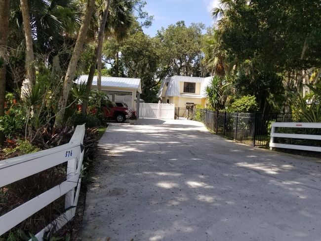 576 Sw Rustic Cir, House other with 3 bedrooms, 2 bathrooms and null parking in Stuart FL | Image 54