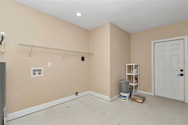 Laundry area w/access door to home | Image 42