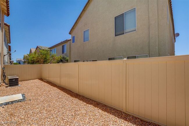 View of yard with central air condition unit and a fenced backyard | Image 23