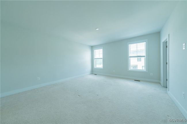 Unfurnished room with baseboards and light colored carpet | Image 32