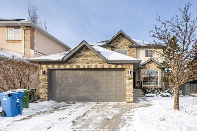 126 Strathridge Close Sw, Home with 7 bedrooms, 3 bathrooms and 4 parking in Calgary AB | Image 2