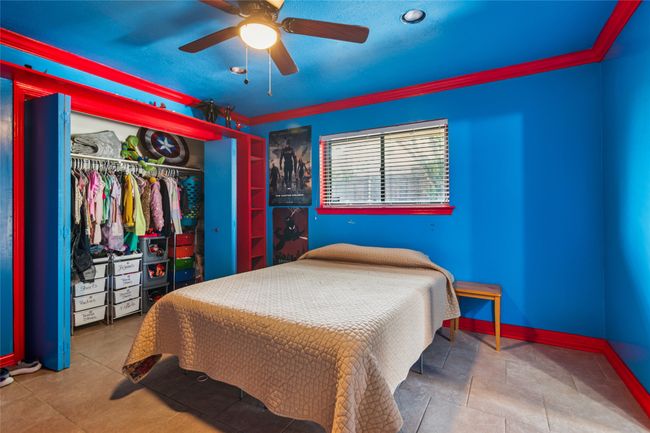 Bedroom featuring a closet and a ceiling fan | Image 20