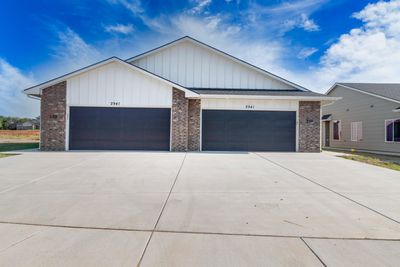 View of front of property with a garage | Image 1