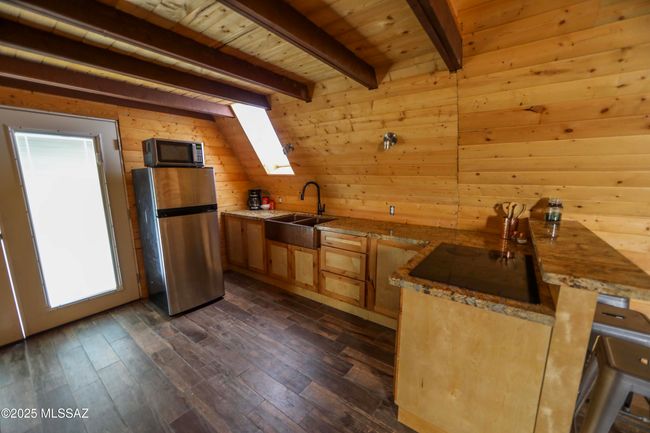 kitchen looking towards double doors | Image 8