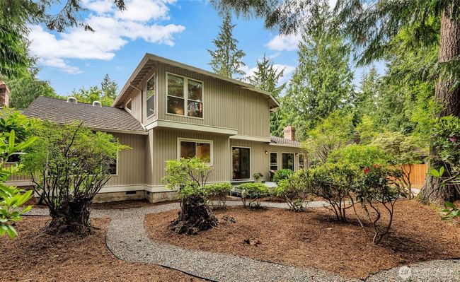 Backyard offers wooded beauty sprinkled throughout with splashes of color from native plants | Image 30