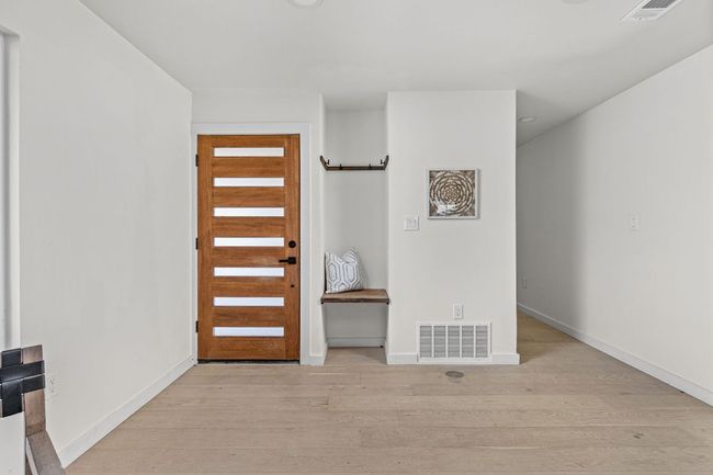 Entrance foyer with light wood-style floors | Image 5