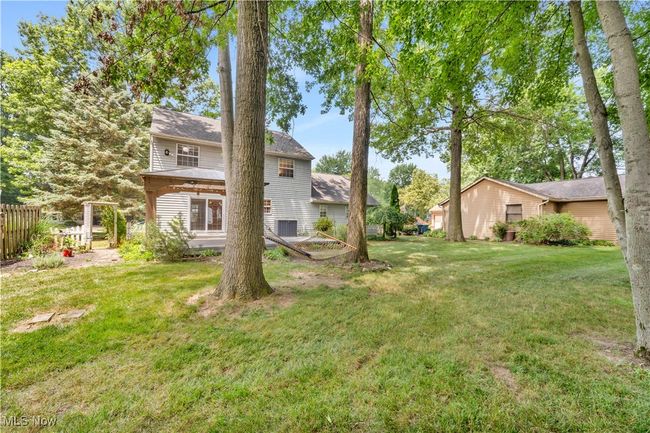 SPACIOUS AND WOODED BACKYARD | Image 35