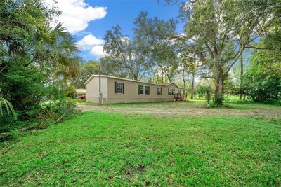 9649 Ne 91st Terrace, House other with 4 bedrooms, 2 bathrooms and null parking in Fort Mc Coy FL | Image 3