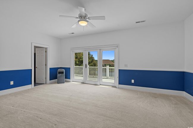 Spare room featuring carpet flooring and a ceiling fan | Image 30