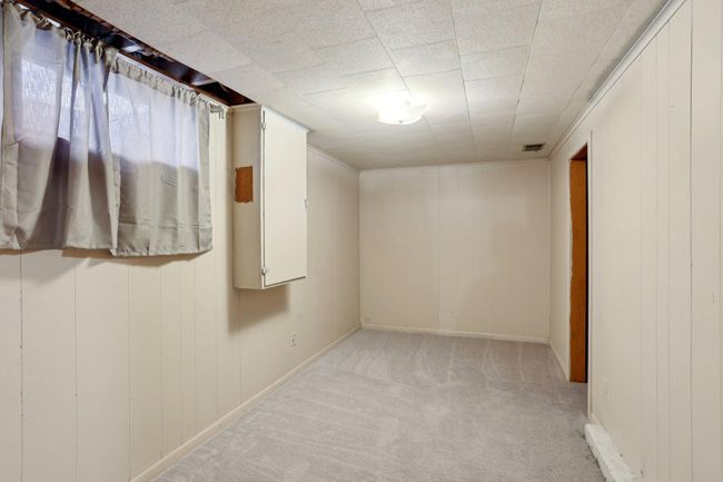 11749 Crooked Lake Blvd Nw, House other with 4 bedrooms, 1 bathrooms and null parking in Coon Rapids MN | Image 25