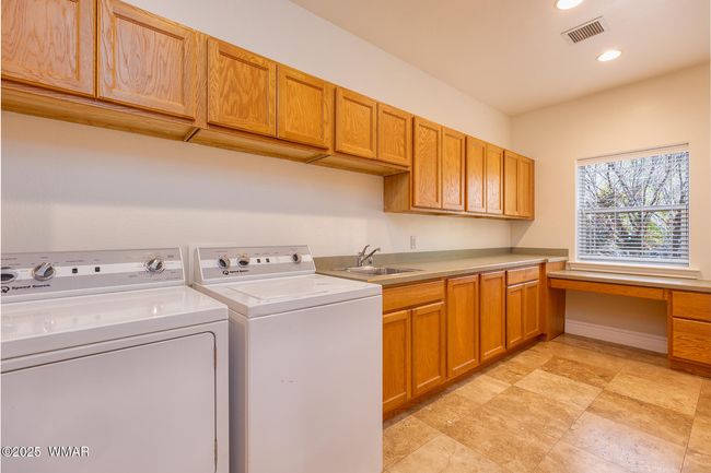 Loaded Laundry Room | Image 34